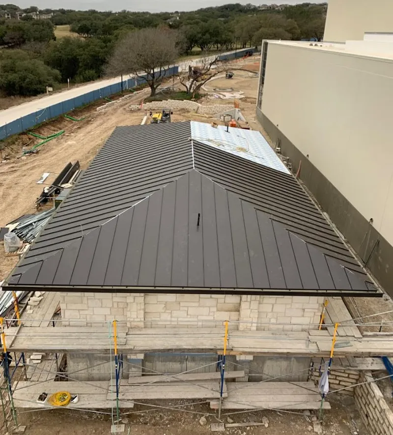 Metal roof new construction with scaffolding in Morganton